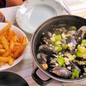 Pot with mussels in Bruges