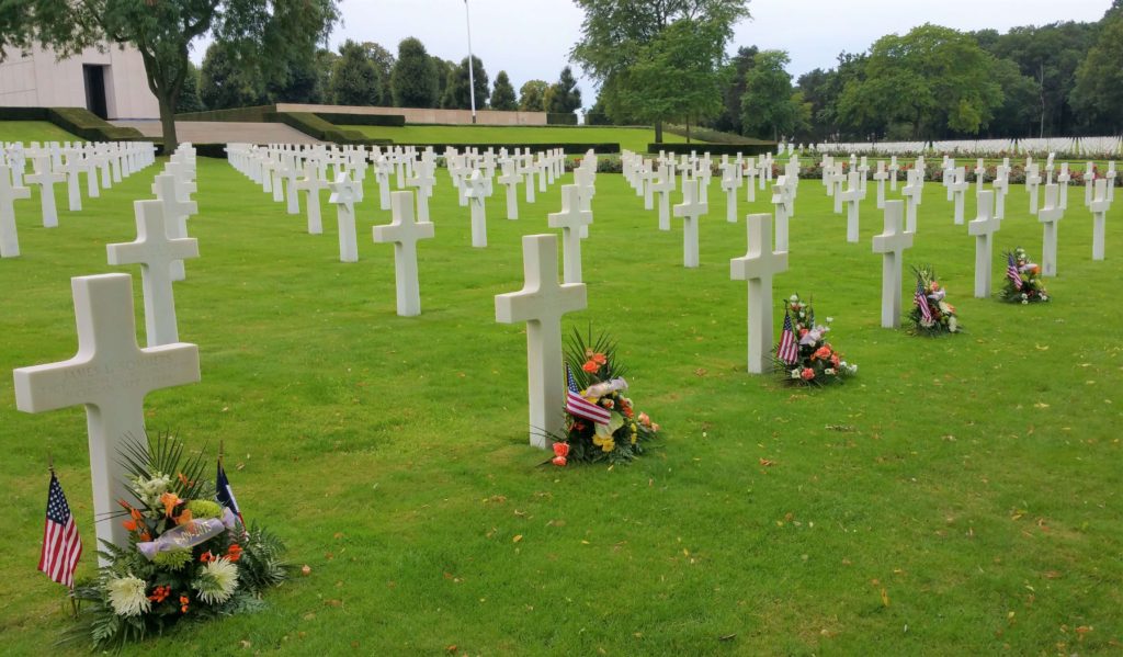 Lorraine American Cemetery rows of markers with flowers